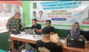 Babinsa Koramil 2303/Pulomerak, Puan Ter Pendampingan Membayar Pajak