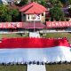 Sinergi Polres Jeneponto dan Mapala Unibos Kibarkan Merah Putih Raksasa di HUT ke-80 RI