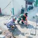 Babinsa Koramil 2303/Pulomerak Bersama Warga Laksanakan Karya Bakti Pemasangan Paving Blok dan Pondasi