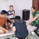 Babinsa Pulomerak Gencarkan Komsos, Bahas Keamanan Lingkungan dan Pemanfaatan Program TMMD