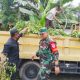 Babinsa Koramil 2307/Ciwandan Bersama Warga Gelar Kerja Bakti Bersihkan Sungai dan Saluran Air