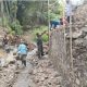 Babinsa Koramil 2305/Cinangka Gotong Royong Bantu Pembangunan Rumah Warga Melalui Karya Bakti